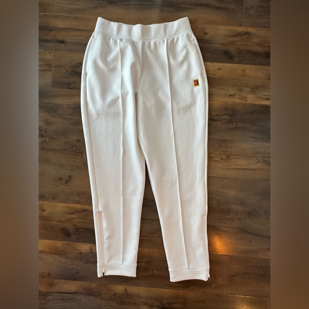 Nike White Track Pants with Small Multicolor Patch
